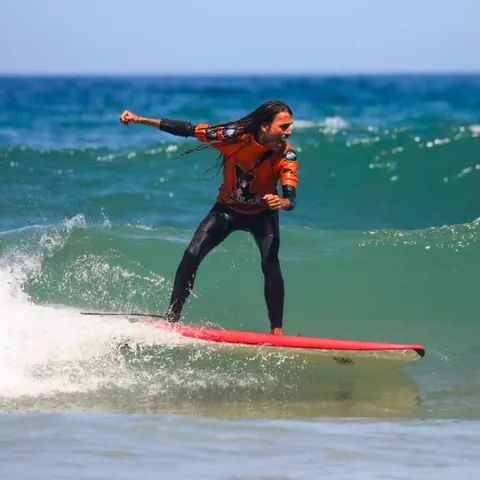 Surfer riding a wave in Lagos
